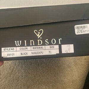 Brand new never worn, only tried on in store! 
7.5 Black peep toe high heel!